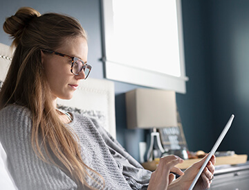 Woman learning how to read phone bill